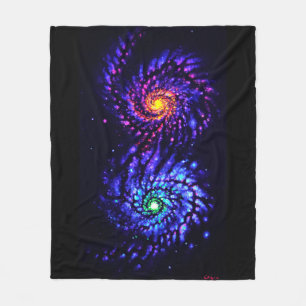Colourful galaxies fleece blanket