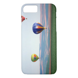 Colourful hot air balloons float over wheat iPhone 8/7 case