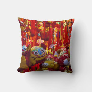 Colourful items for sale in a shop in Hong Kong Throw Pillow