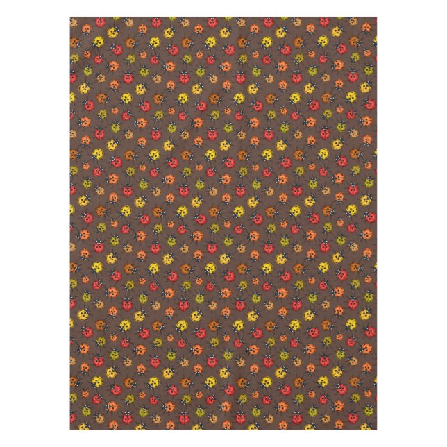 Colourful ladybugs on brown tablecloth (Front)