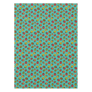 Colourful ladybugs on turquoise tablecloth