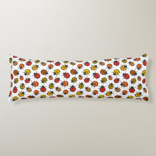Colourful ladybugs on white body pillow