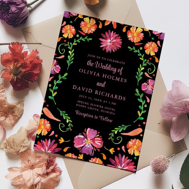 Colourful Mexican Floral Fiesta Wedding Invitation (Colorful Mexican Floral Fiesta Wedding Invitation on a table full with colorful flowers.)