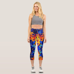 colourful mix of neon paints swirling on black  capri leggings