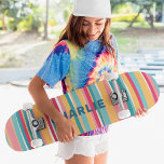 Colourful Modern Stripes Custom Personalized Name Skateboard<br><div class="desc">Colourful Modern Stripes Custom Personalized Name Skateboard features your personalized name in modern typography on a colourful striped background in pink, blue, orange and white. Personalize by editing the text in the text box provided. Give a custom made gift, personalized skateboard to your favourite skateboarder for Christmas, birthday or your...</div>