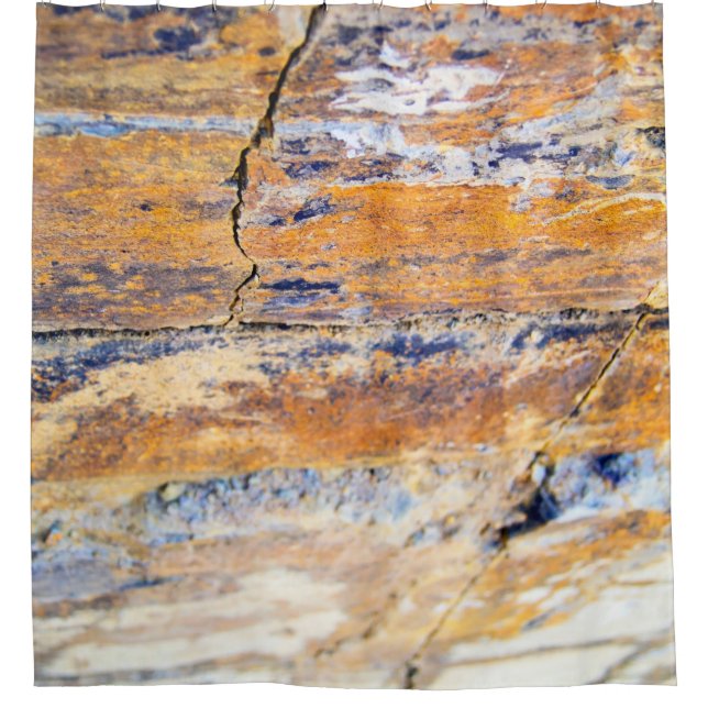 Colourful natural stone wall pattern in a quarryan (Front)