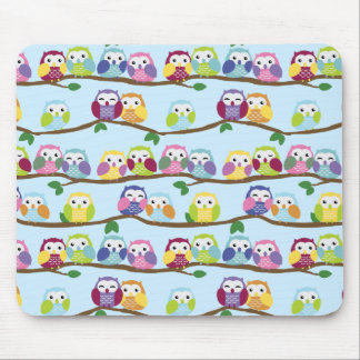 Colourful owls on a branch mouse pad