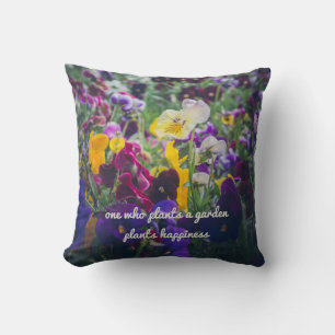 Colourful pansies in bloom in the country garden throw pillow