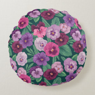 Colourful pansies on dark greenish blue round pillow