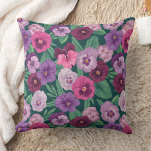 Colourful pansies on dark greenish blue throw pillow