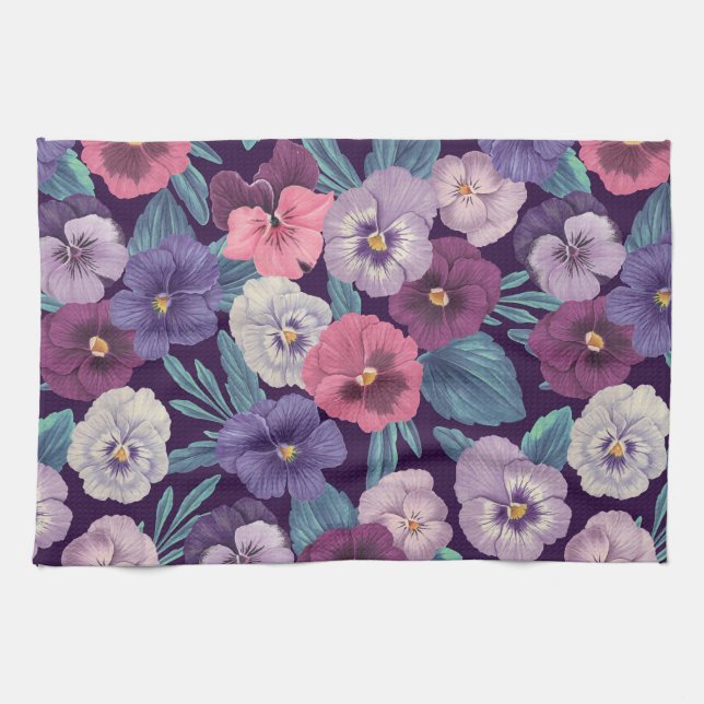 Colourful pansies on deep violet kitchen towel (Horizontal)