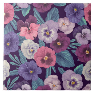 Colourful pansies on deep violet tile