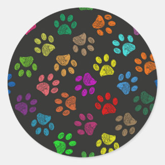 Colourful paw prints classic round sticker