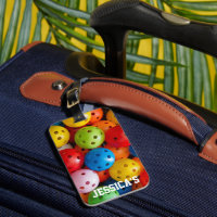 Colourful pickleballs, with custom text 