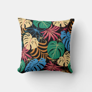 Colourful pillow with a tropical leaf pattern