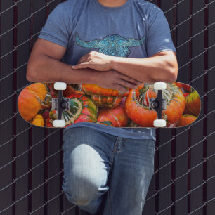 Colourful pumpkins skateboard