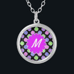 Colourful Retro Flower Pattern Monogram Silver Plated Necklace<br><div class="desc">This pretty, girly design features a bright, colourful floral pattern in shades of pink, purple, blue and green on a black background. It has a flower - shaped space in orchid - purple where you can add your monogram / initial in white to personalize. It's a slightly retro, very chic...</div>
