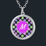 Colourful Retro Flower Pattern Monogram Silver Plated Necklace<br><div class="desc">This pretty, girly design features a bright, colourful floral pattern in shades of pink, purple, blue and green on a black background. It has a flower - shaped space in orchid - purple where you can add your monogram / initial in white to personalize. It's a slightly retro, very chic...</div>