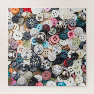 Colourful sewing buttons, natural fabric backgroun jigsaw puzzle