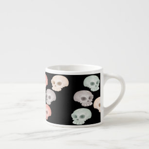 colourful skulls on black espresso cup