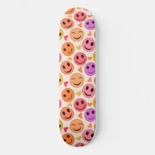 Colourful Smiling Happy faces with hearts Skateboard