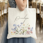 Colourful Spring Wildflower Meadow Garden Wedding  Tote Bag<br><div class="desc">Capture the beauty of nature on your special day with our exquisite wildflower watercolor bride tote bag. Elegant, unique, and blooming with love. Use the text fields to personalize your design with your own wording and details. If you want to change the font style, colour or text placement, simply click...</div>