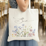 Colourful Spring Wildflower Meadow Garden Wedding  Tote Bag<br><div class="desc">Capture the beauty of nature on your special day with our exquisite wildflower watercolor bride tote bag. Elegant, unique, and blooming with love. Use the text fields to personalize your design with your own wording and details. If you want to change the font style, colour or text placement, simply click...</div>