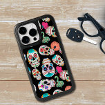 Colourful Sugar Skulls Pattern<br><div class="desc">Bright images of sugar skulls make a colourful pattern on this colourful and unique phone case. There are several different skull images,  all individual in various colours,  and placed on a dramatic black background.</div>