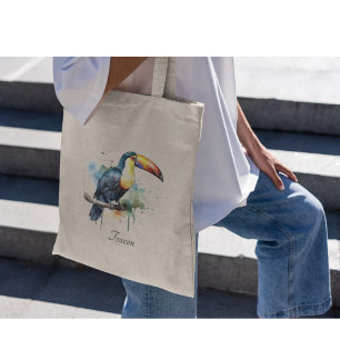 colourful toucan sitting on a  branch tote bag