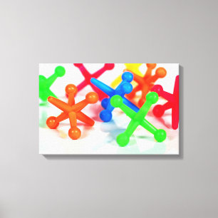 colourful toy jacks canvas print