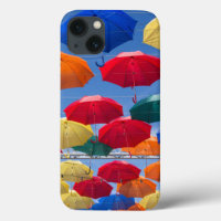 Colourful umbrellas in the sky blue orange red