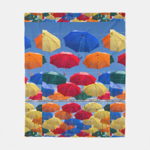 Colourful umbrellas in the sky blue orange red fleece blanket