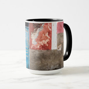 Colourful wall with blue door mug