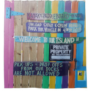 Colourful Welcome Island sign Carribean