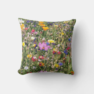 Colourful wildflower meadow, vibrant pattern. throw pillow