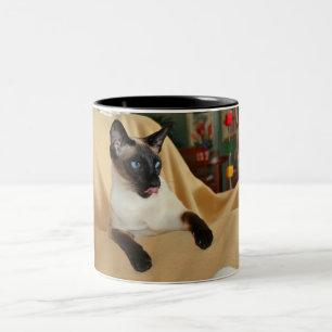Comical Seal Point Siamese Cat Licking It's Nose Two-Tone Coffee Mug