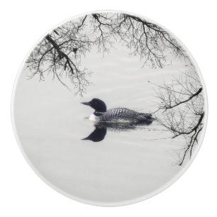 Common Loon Swims in a Northern Lake in Winter Ceramic Knob