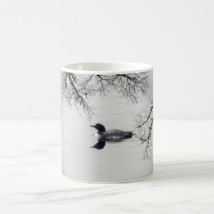 Common Loon Swims in a Northern Lake in Winter Coffee Mug