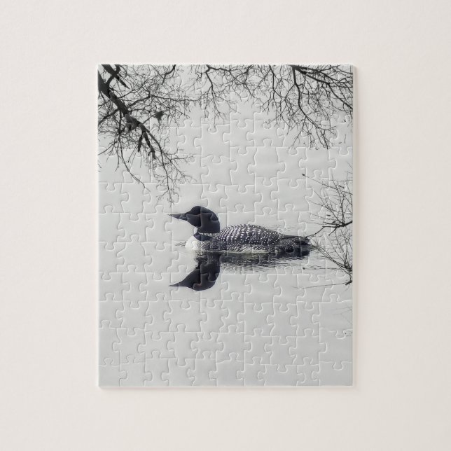 Common Loon Swims in a Northern Lake in Winter Jigsaw Puzzle (Vertical)