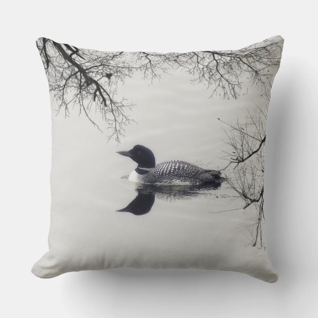 Common Loon Swims in a Northern Lake in Winter Throw Pillow (Front)
