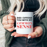 Common Sense Mug<br><div class="desc">The “Sorry I Offended You With My Common Sense” design is a humourous and bold conversation starter for those who value straightforward thinking. It acknowledges unintentional bluntness and celebrates the unique sense of humour that can sometimes be the best policy. Ideal for friends and coworkers.</div>