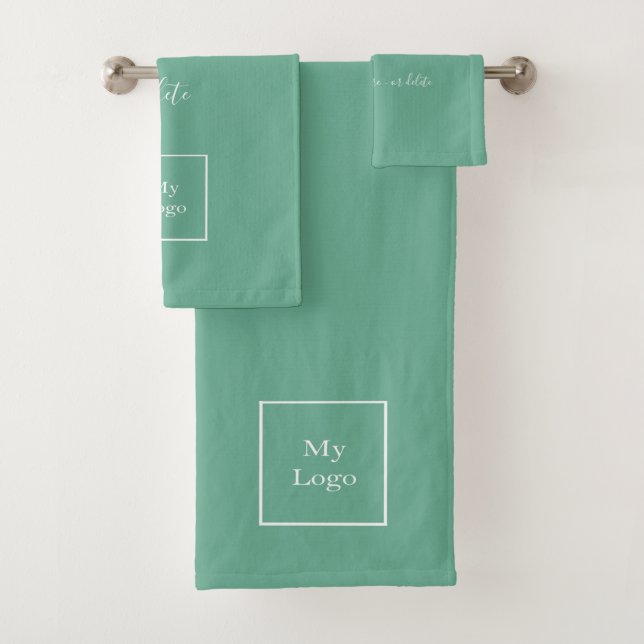 Company logo green white text business bath towel (Insitu)