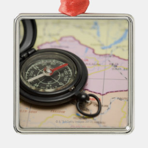 Compass on a map 2 metal ornament