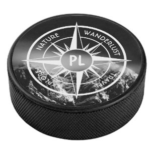 Compass star emblem monogram dramatic mountains hockey puck