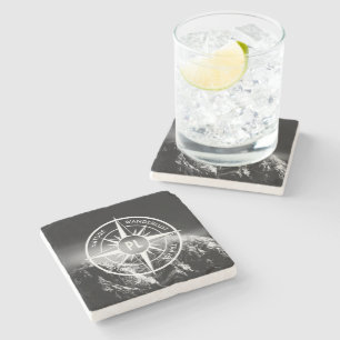 Compass star emblem monogram dramatic mountains stone coaster