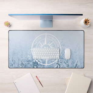 Compass star emblem monogram winter spruce forest desk mat