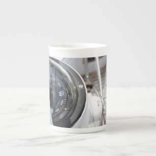 Compass that gives direction to an adventure. bone china mug