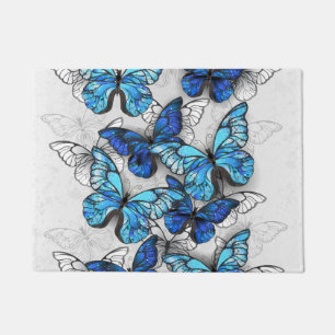 Composition of White and Blue Butterflies Doormat