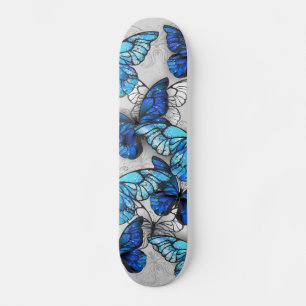 Composition of White and Blue Butterflies Skateboard