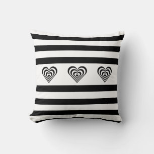 Concentric hearts on black & white striped throw pillow